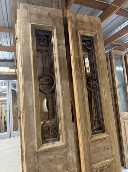 Antique French doors with iron