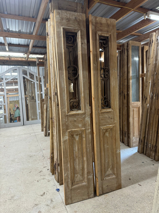 Antique French doors with iron