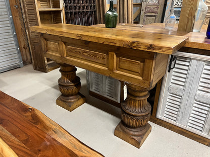 Console with hand-carved columns